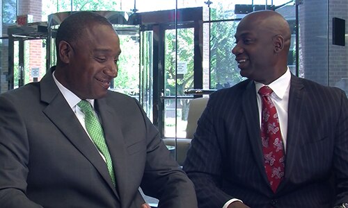 Mentor and Mentee in suits