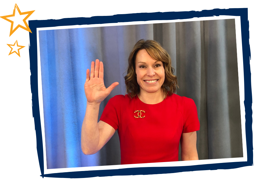 Chrissy Taylor raising her hand