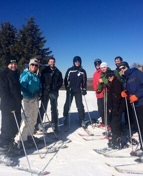 Group of employees skiing