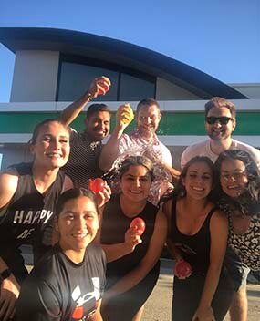 Group of employees on the beach