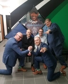 Employee group photo in suits