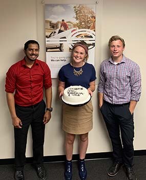 Employees with a cake