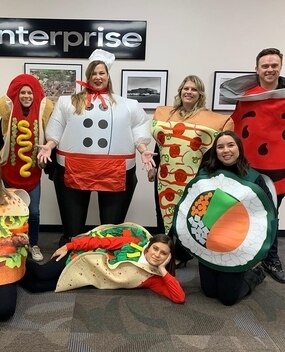 Employees in food themed Halloween costumes