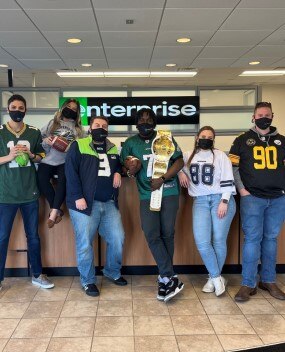 Employees in football attire