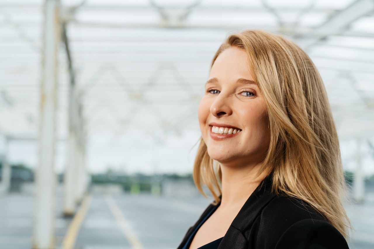 Enterprise Mobility team member smiling. 