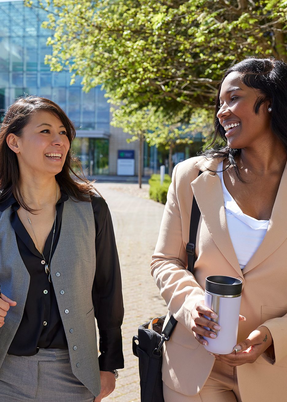 Two Enterprise Mobility team members outside the head office in Egham, UK