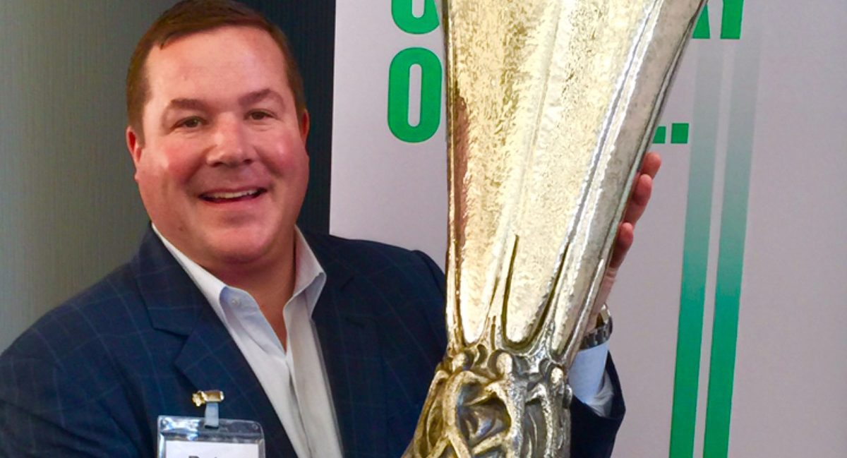 Pete D. Holding a trophy