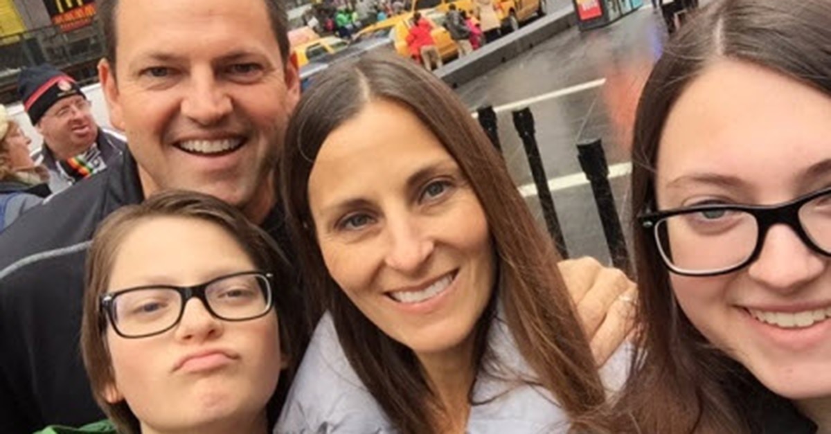 General Manager Dave S. with his family in a street