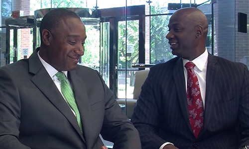 Mentor and Mentee in suits