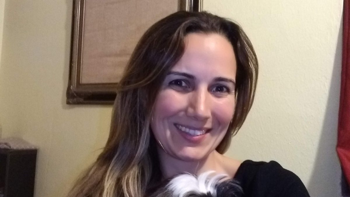 Picture of Clara M. in a home office