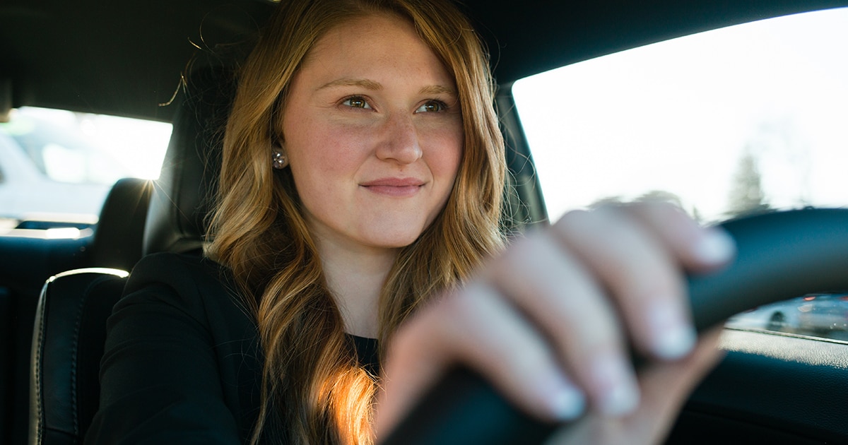 Employee driving a car