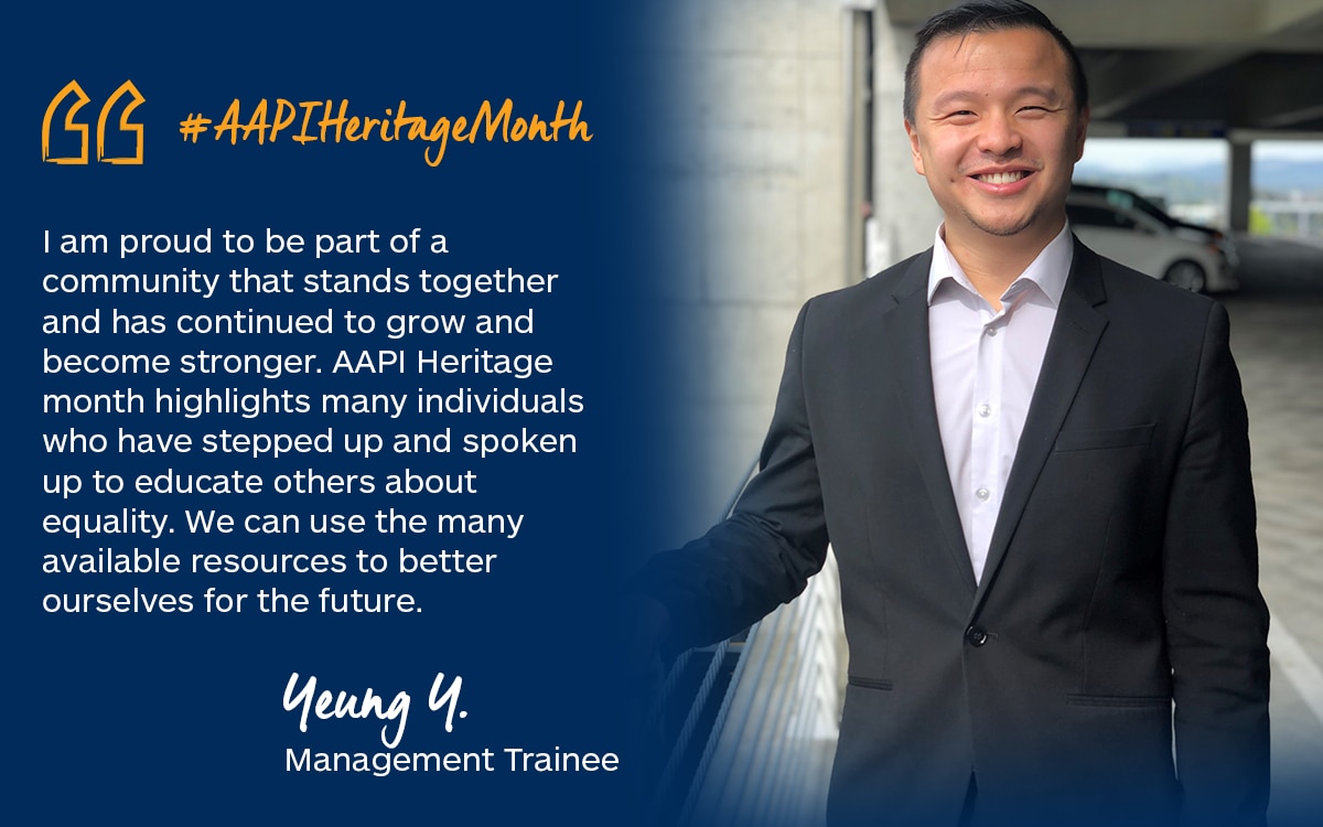 Photo of Yeung Y. in a suit in an Enterprise parking garage with quote