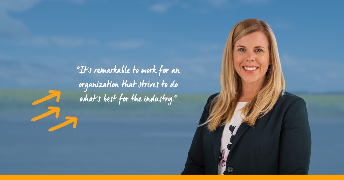 Jennifer Everett Headshot on blue background with quote