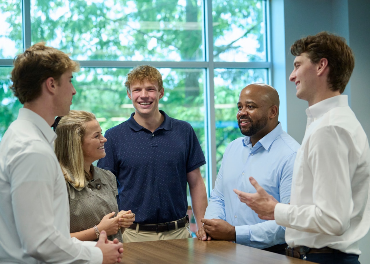 group of employees talking
