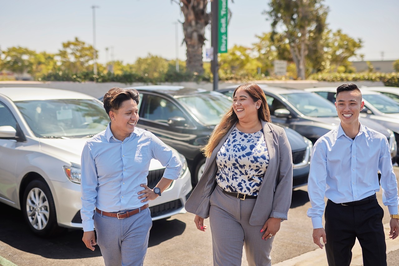 Enterprise Mobility employees walk outside.