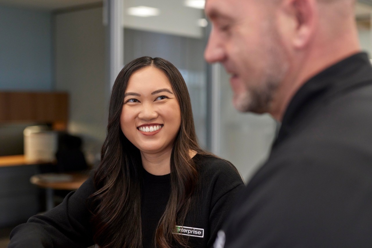 Woman smiles at work