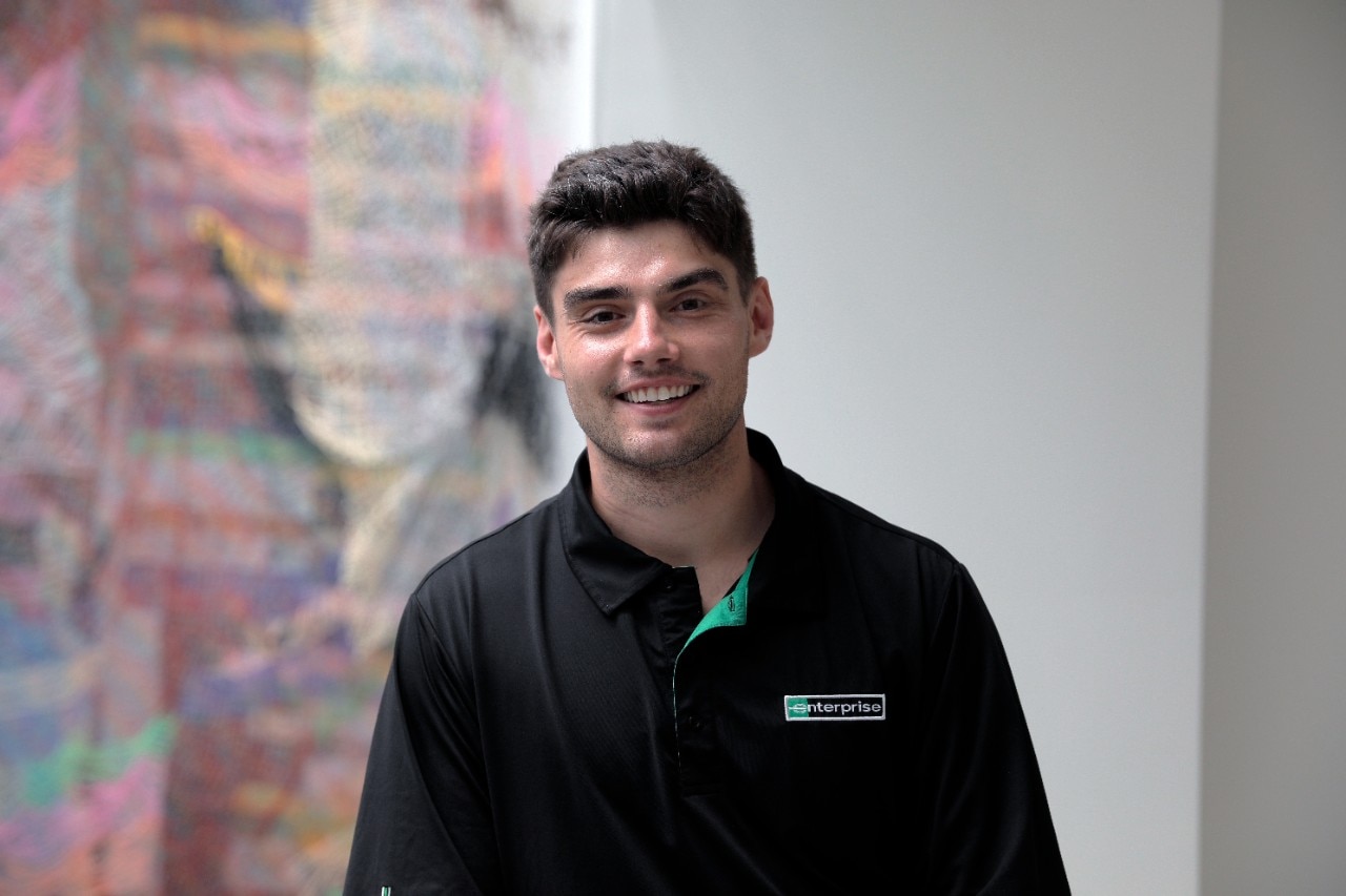 Enterprise Mobility team member standing in airport