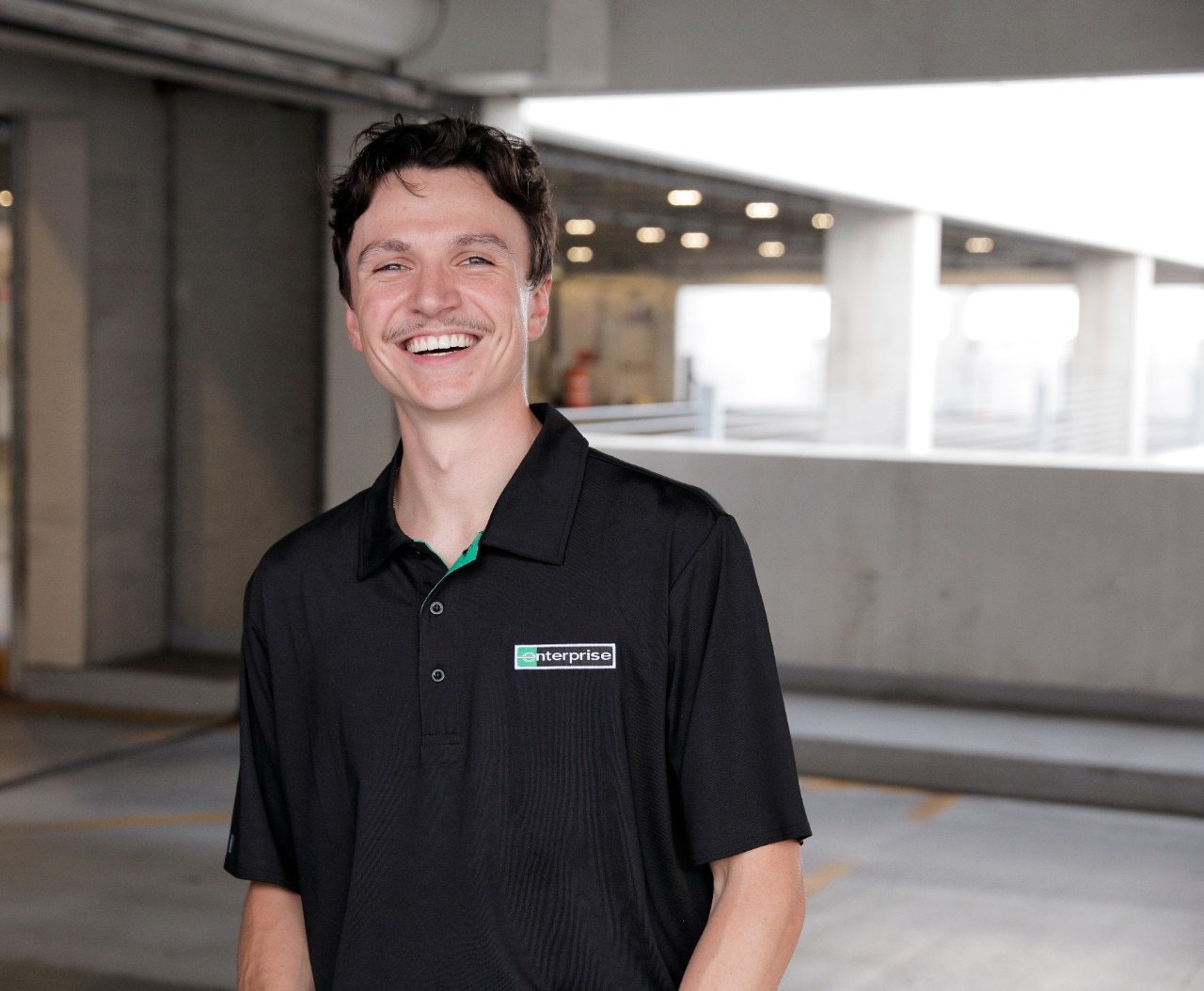 Man standing in parking garage