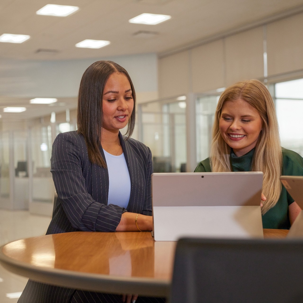Woman smiles at work